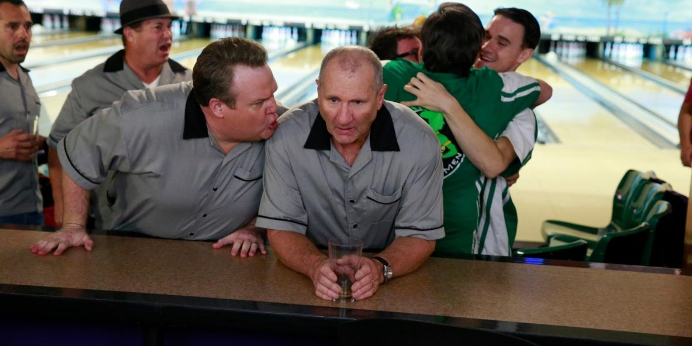 Jay bowling with Cam on Modern Family