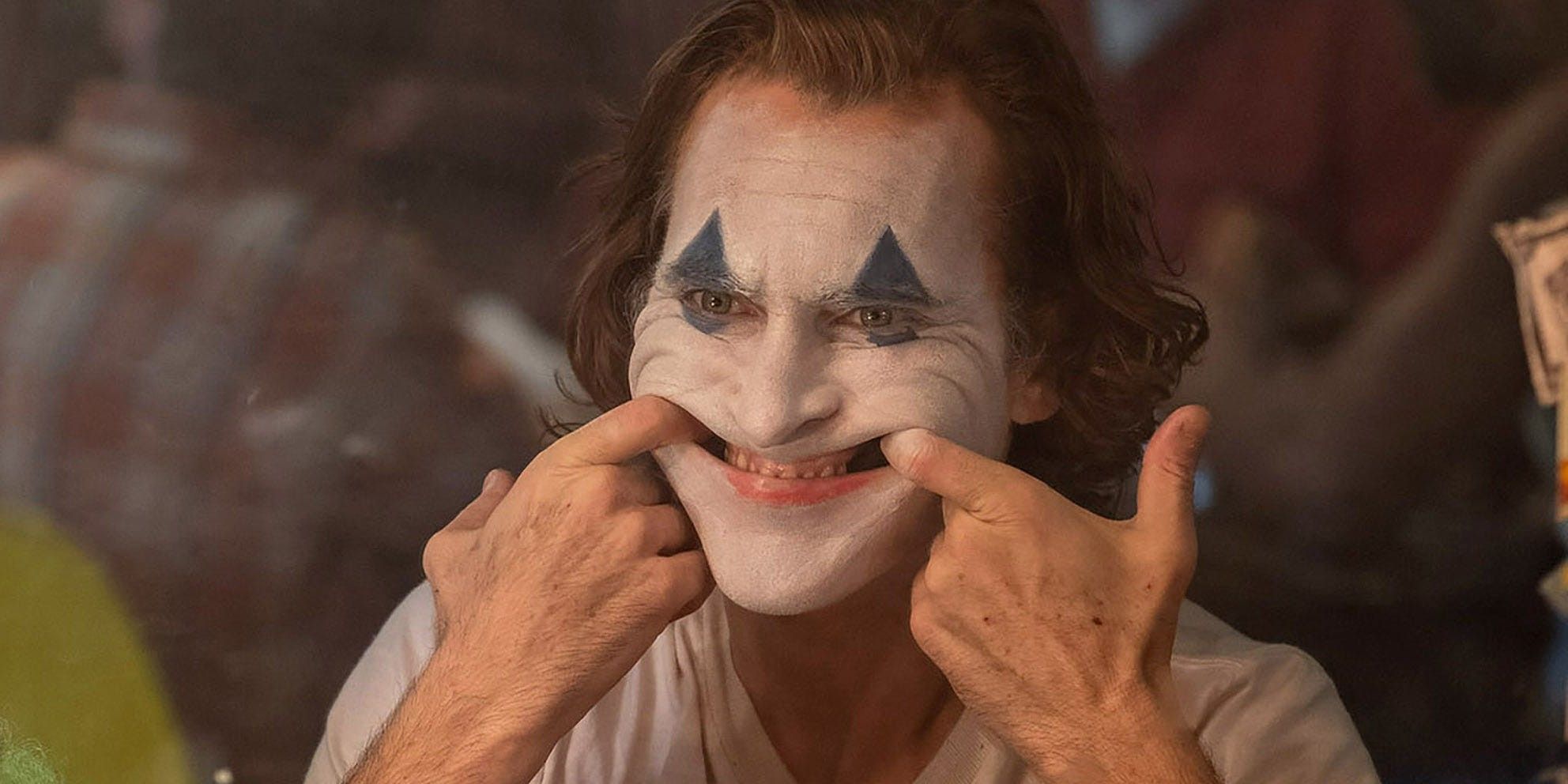 Joaquin Phoenix grin in Joker movie