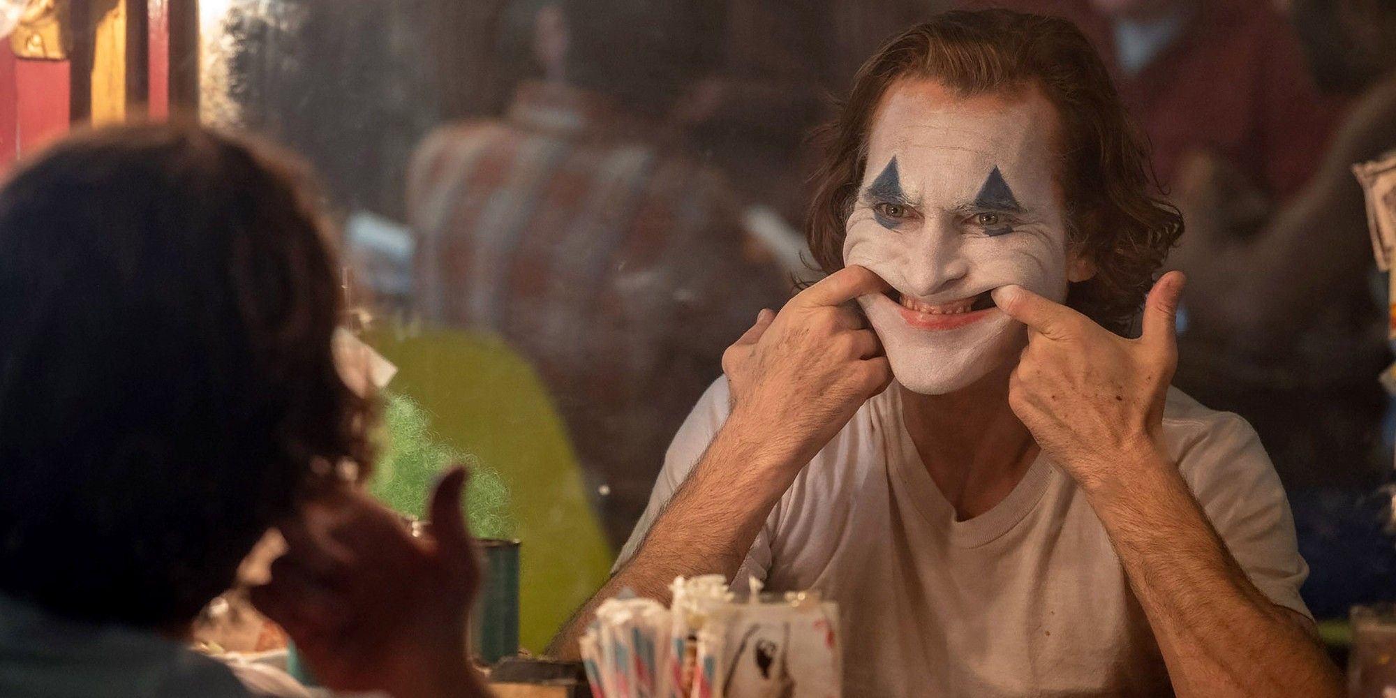 Joaquin Phoenix reflection in Joker movie
