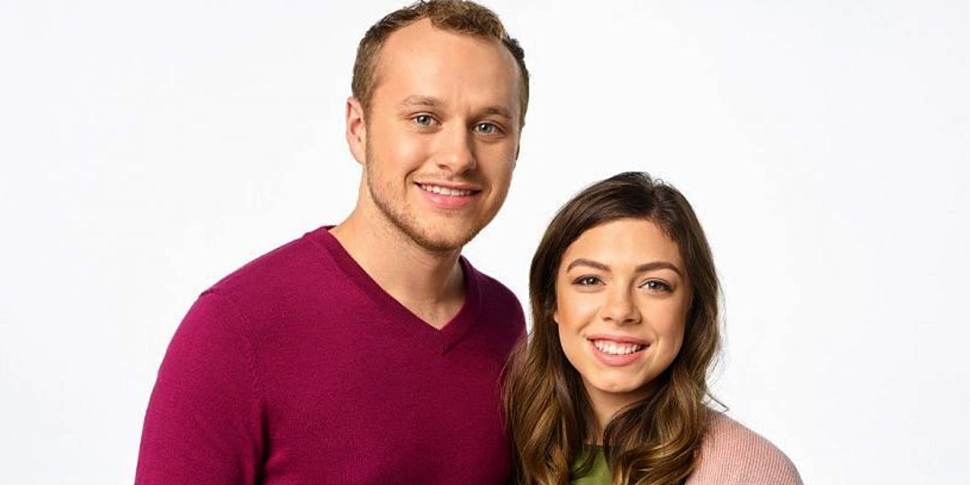 Josiah and Lauren Duggar Counting On posing for portrait with white background
