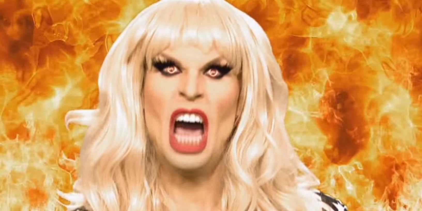 Katya looking Satanic with the fires of Hell behind her on RuPaul's Drag Race
