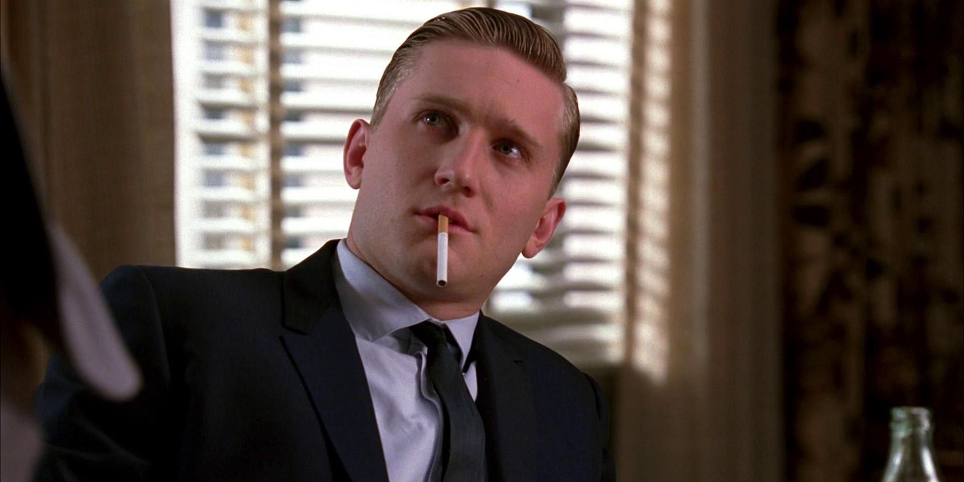 Ken with a cigarette in his mouth in Mad Men