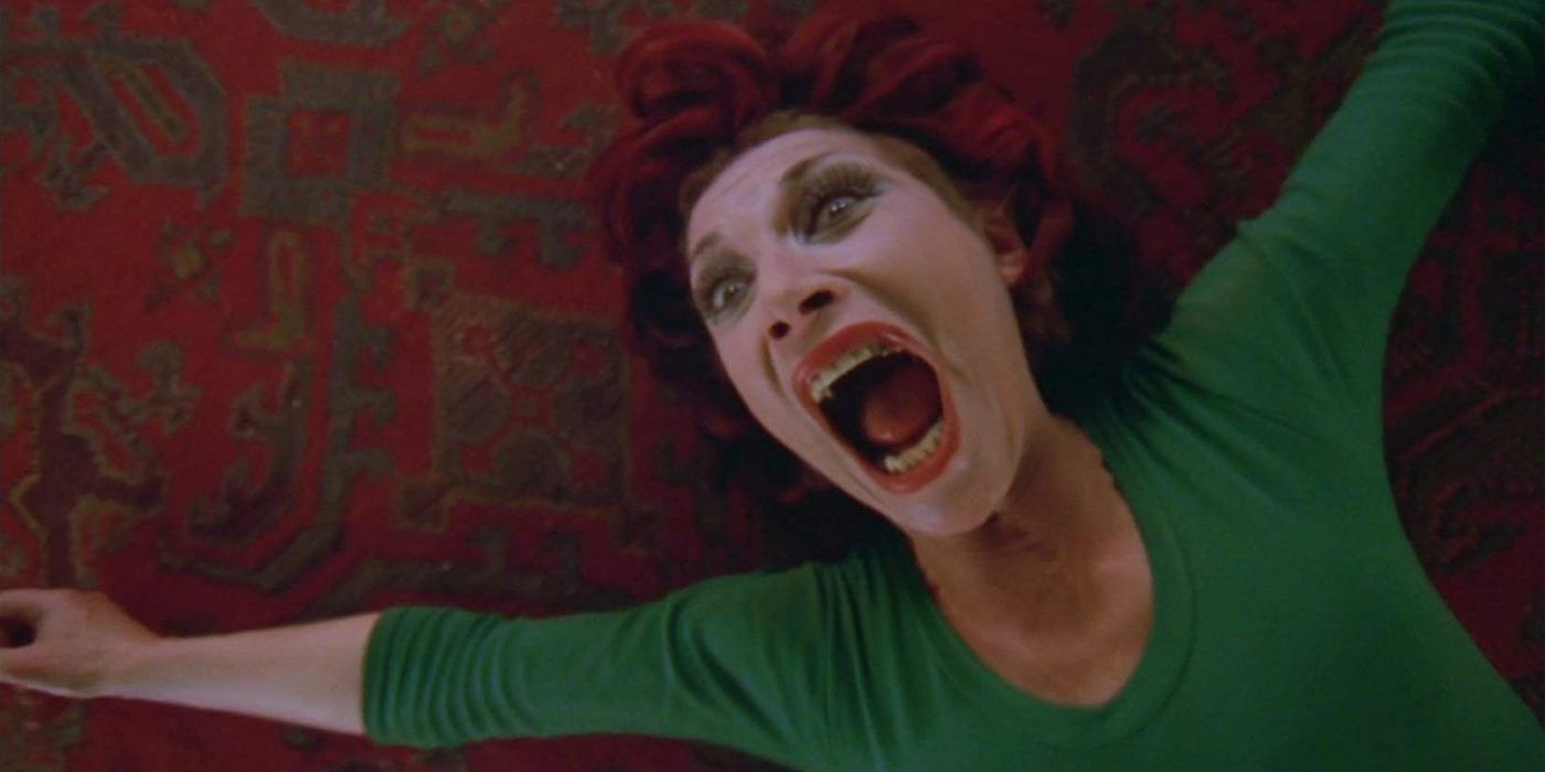 Woman screaming and wearing green in A Clockwork Orange