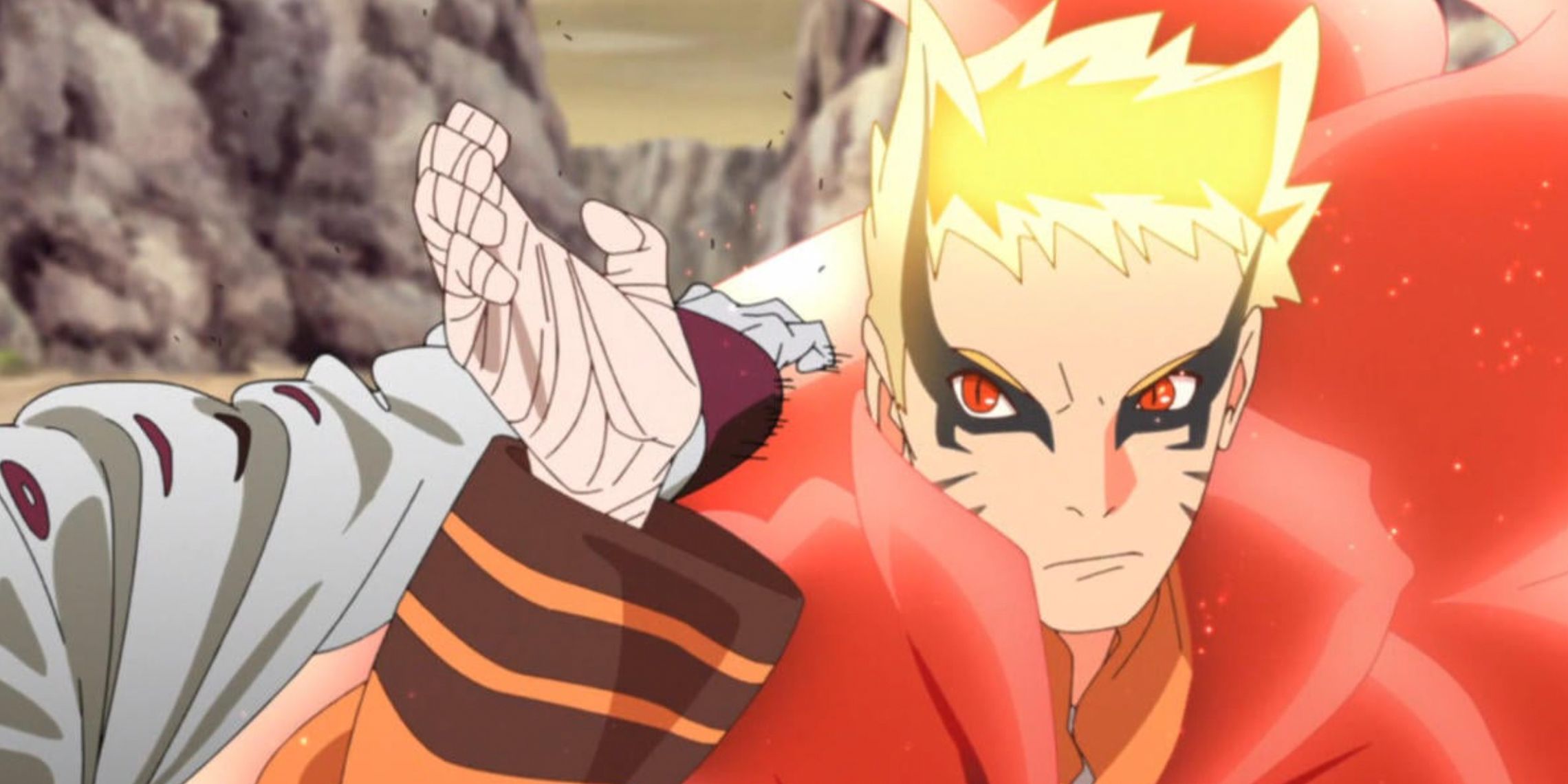 Naruto blocks Isshiki's blow in Boruto's baryon mode