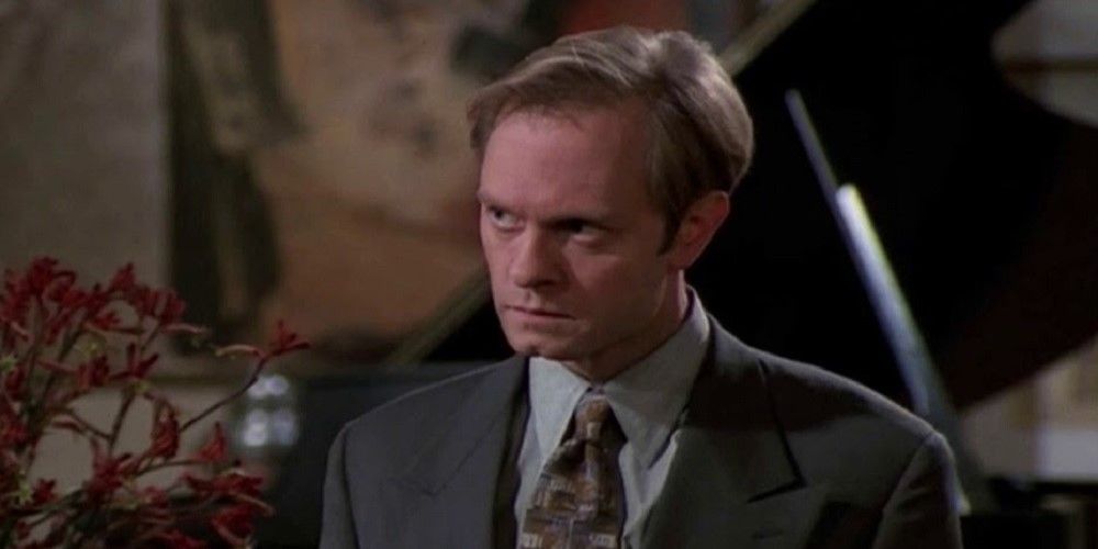 Niles in front of a painting in Frasier