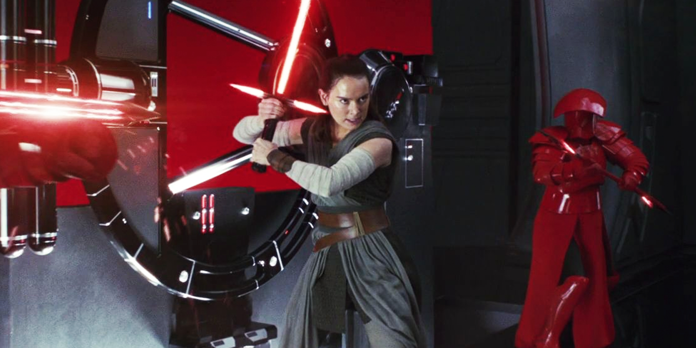 Rey with red lightsaber in Star Wars The Last Jedi