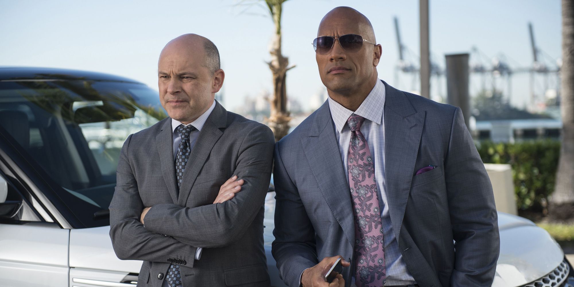 Rob Corddry and Dwayne Johnson wearing suits in Ballers HBO