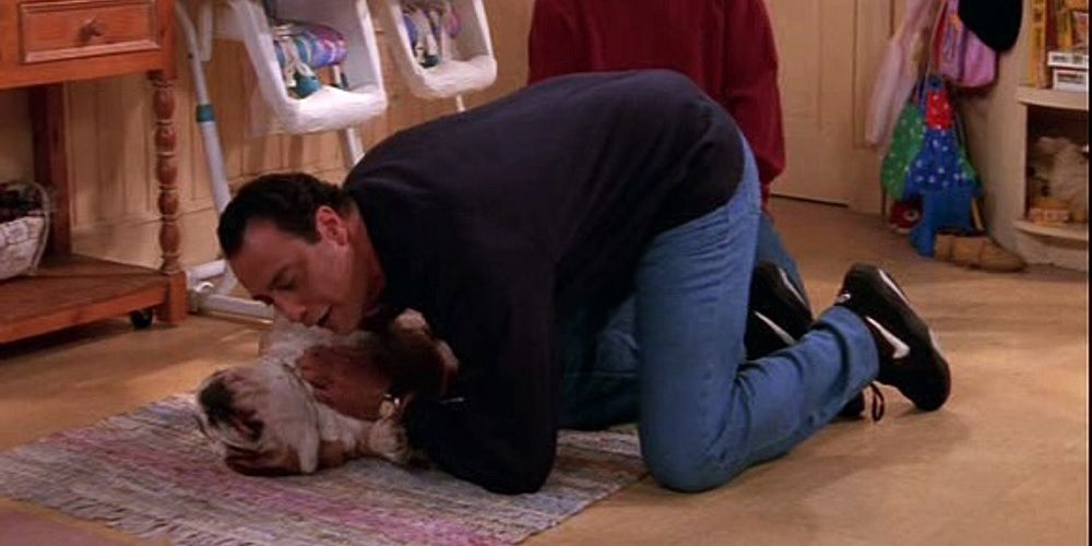 Robert Barone no chão com seu cachorro Shamsky em Everybody Loves Raymond