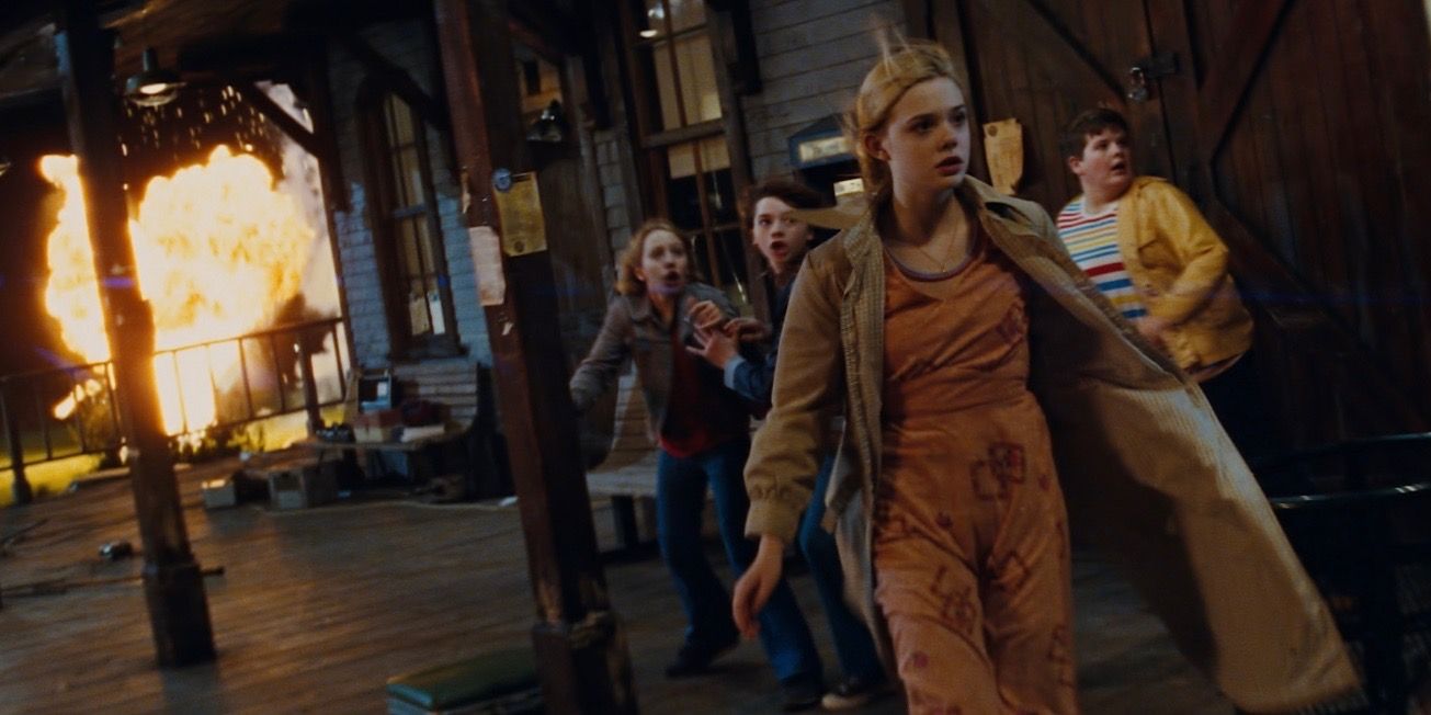 Ryan Lee, Joel Courtney, Elle Fanning, and Riley Griffiths as Cary, Alice, Joe, and Charles in Super 8