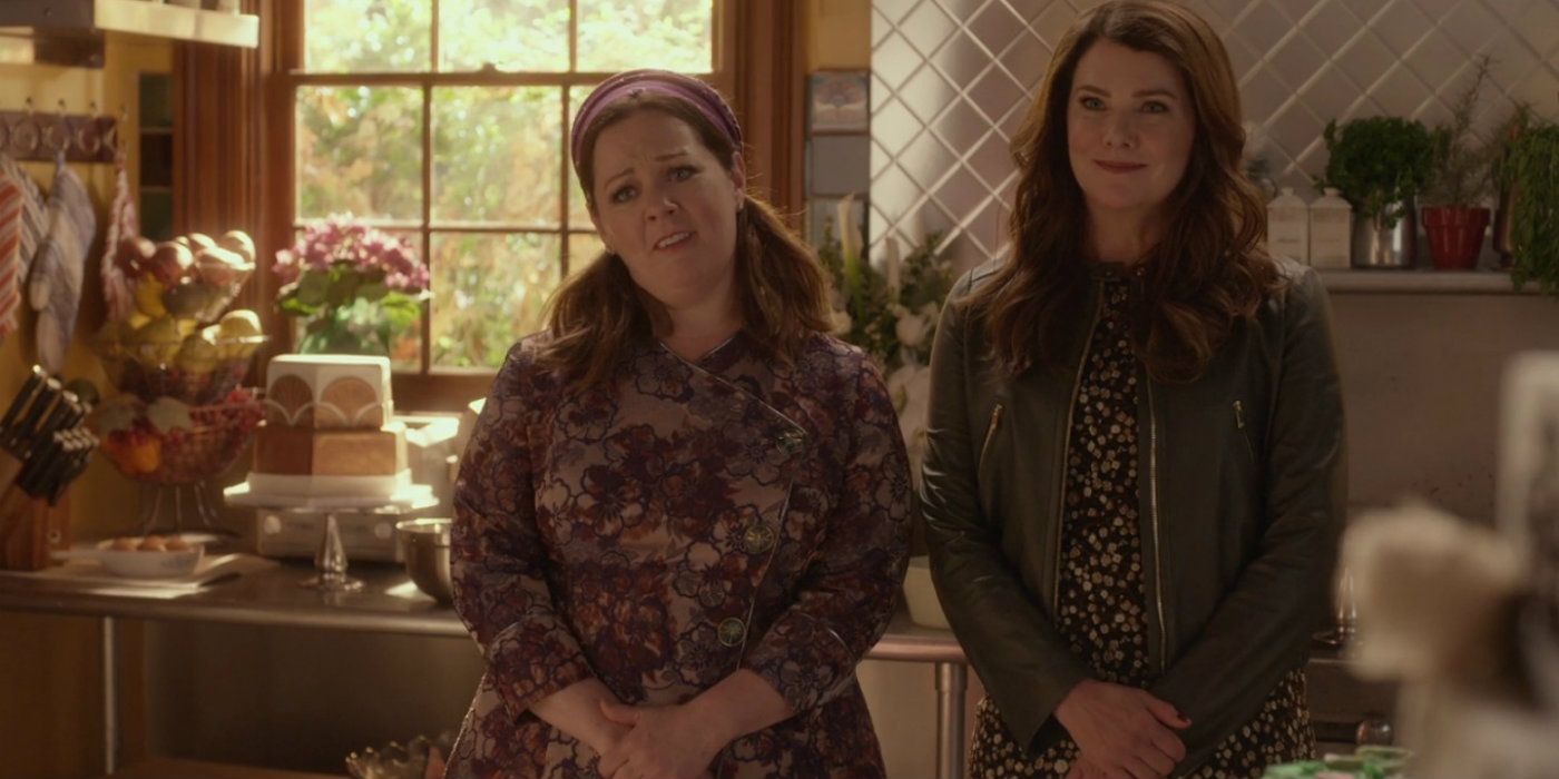 Sookie and Lorelai staring at a wedding cake on Gilmore Girls: A Year In The Life