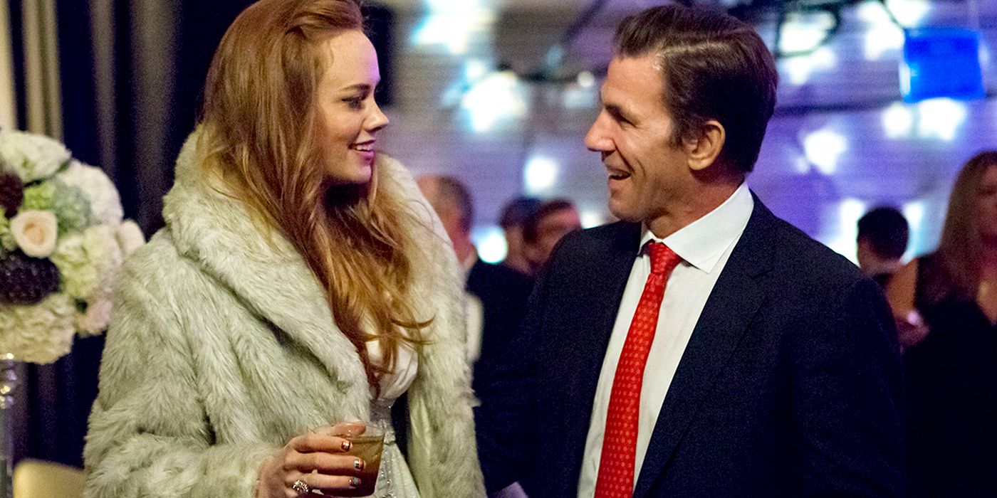 Southern Charm's Kathryn Dennis & Thomas Ravenel smiling closely at an event 