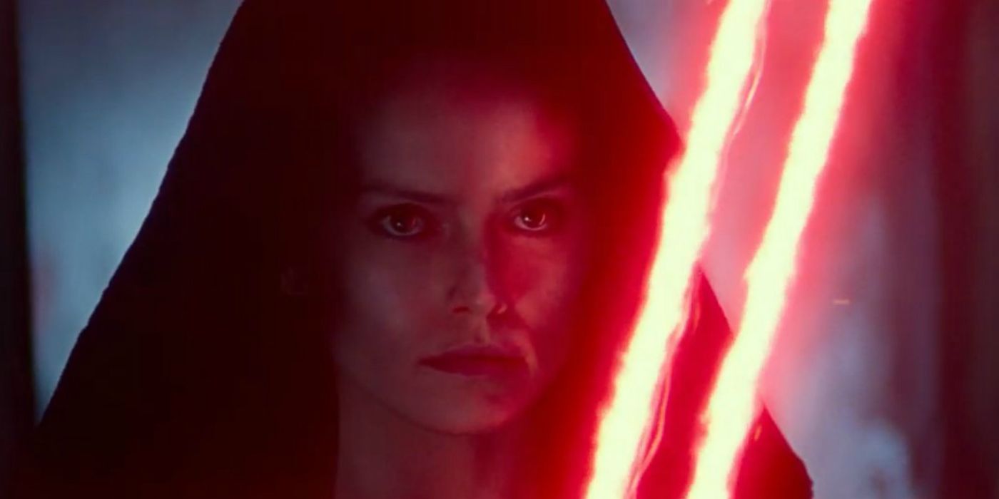 Dark Side Rey activates her lightsaber in The Rise Of Skywalker.