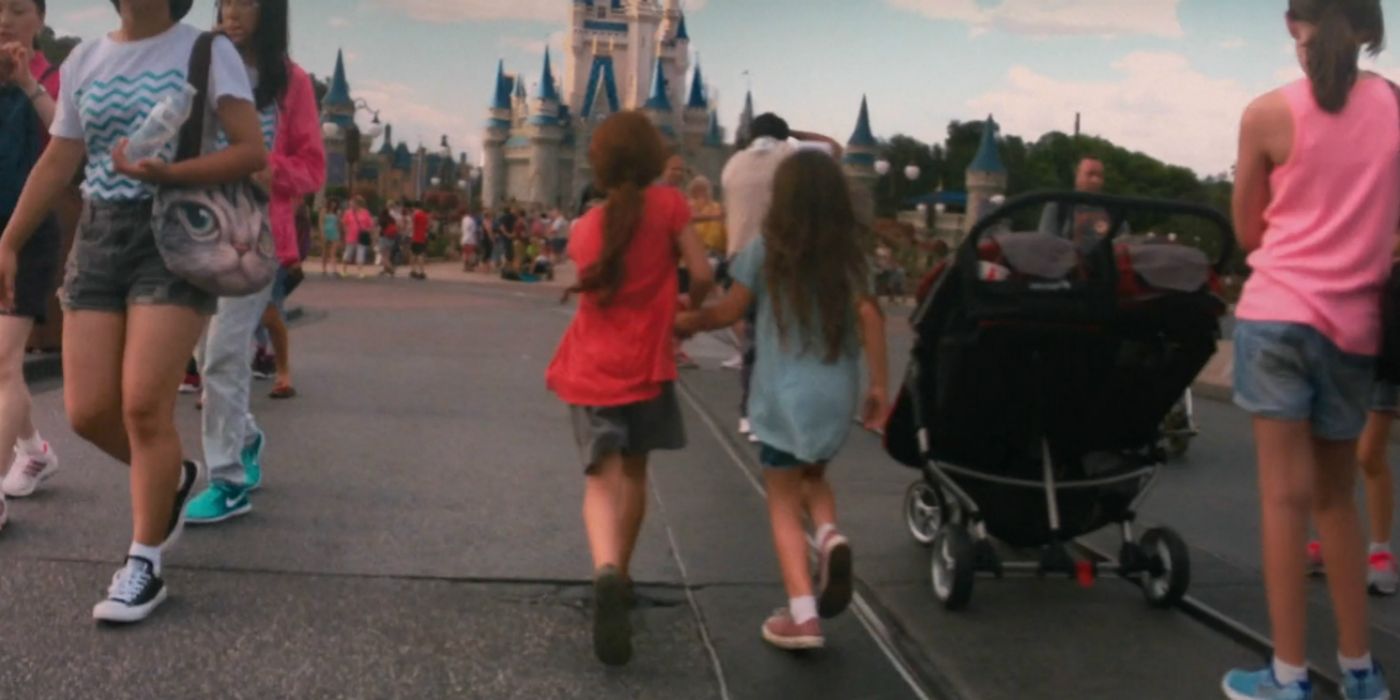 Two little girls run through the Magic Kingdom in The Florida Project 