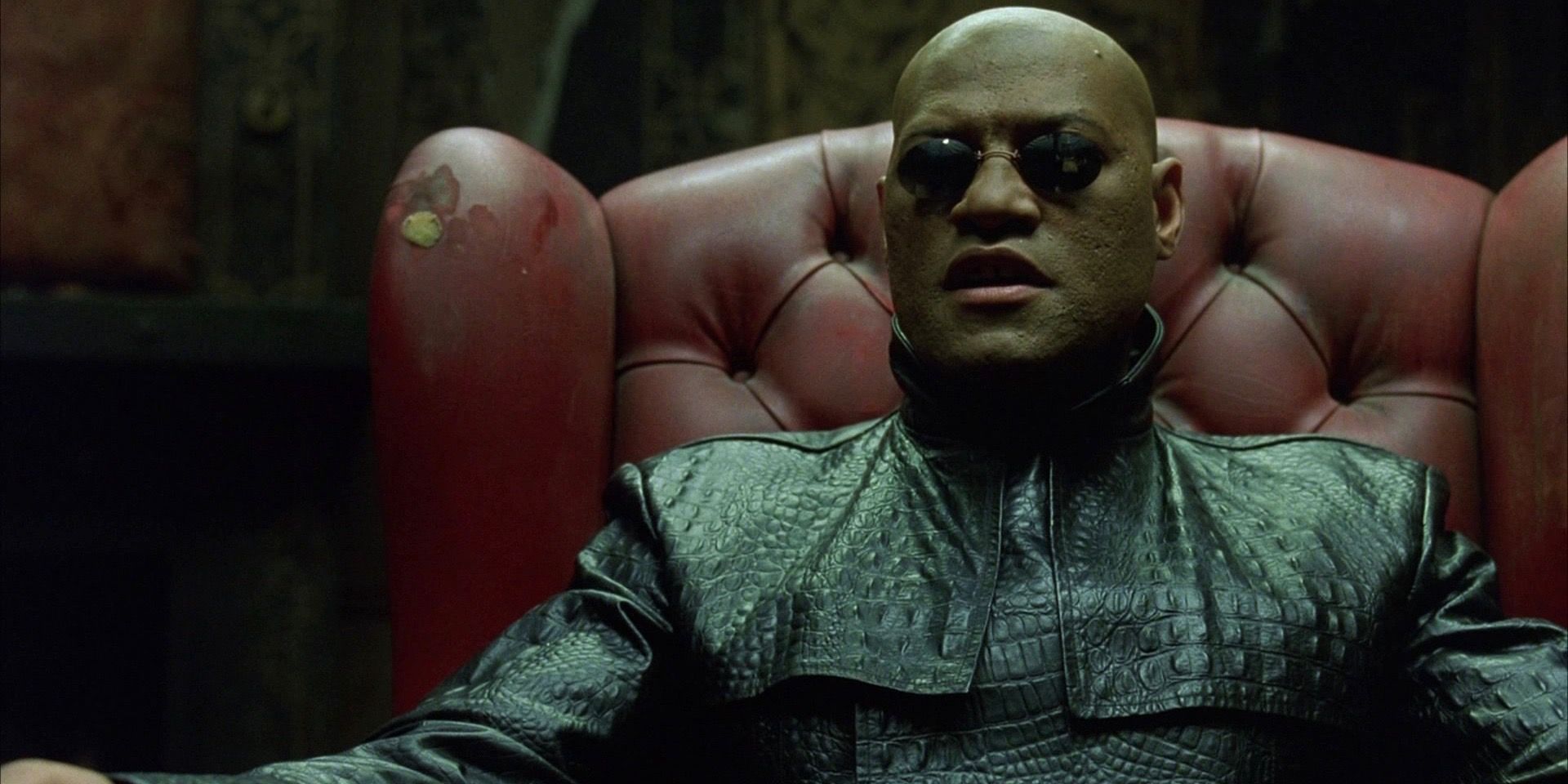 An image of Morpheus sitting in an armchair in The Matrix