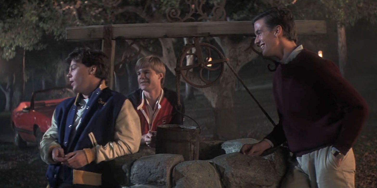 Troy and his friends waiting at the wishing well in The Goonies