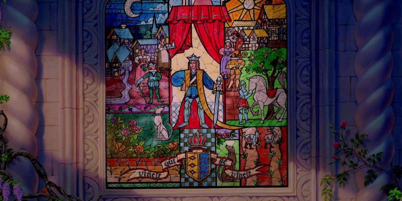 Sun shines on a stained glass window from Beauty and the Beast