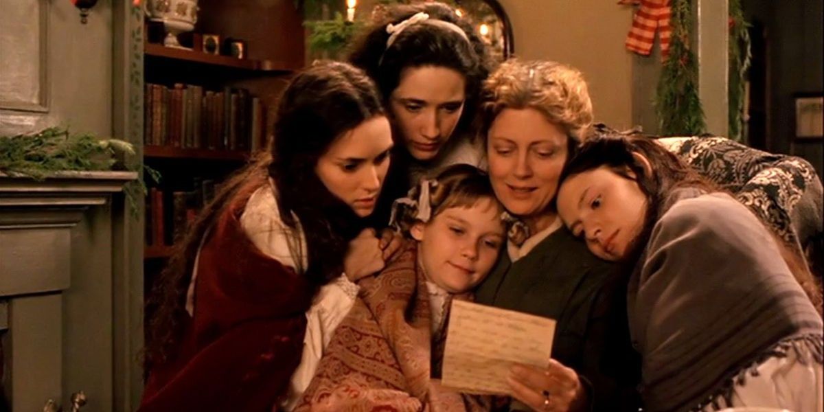 The sisters gather around in Little Women (1994)