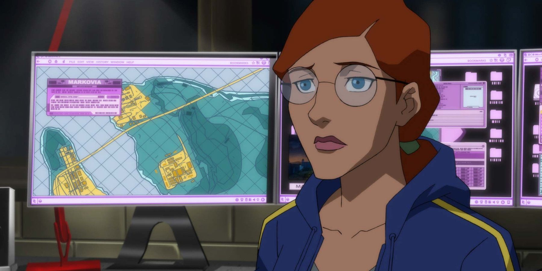 Oracle in front od her computers looking concerned in Young Justice