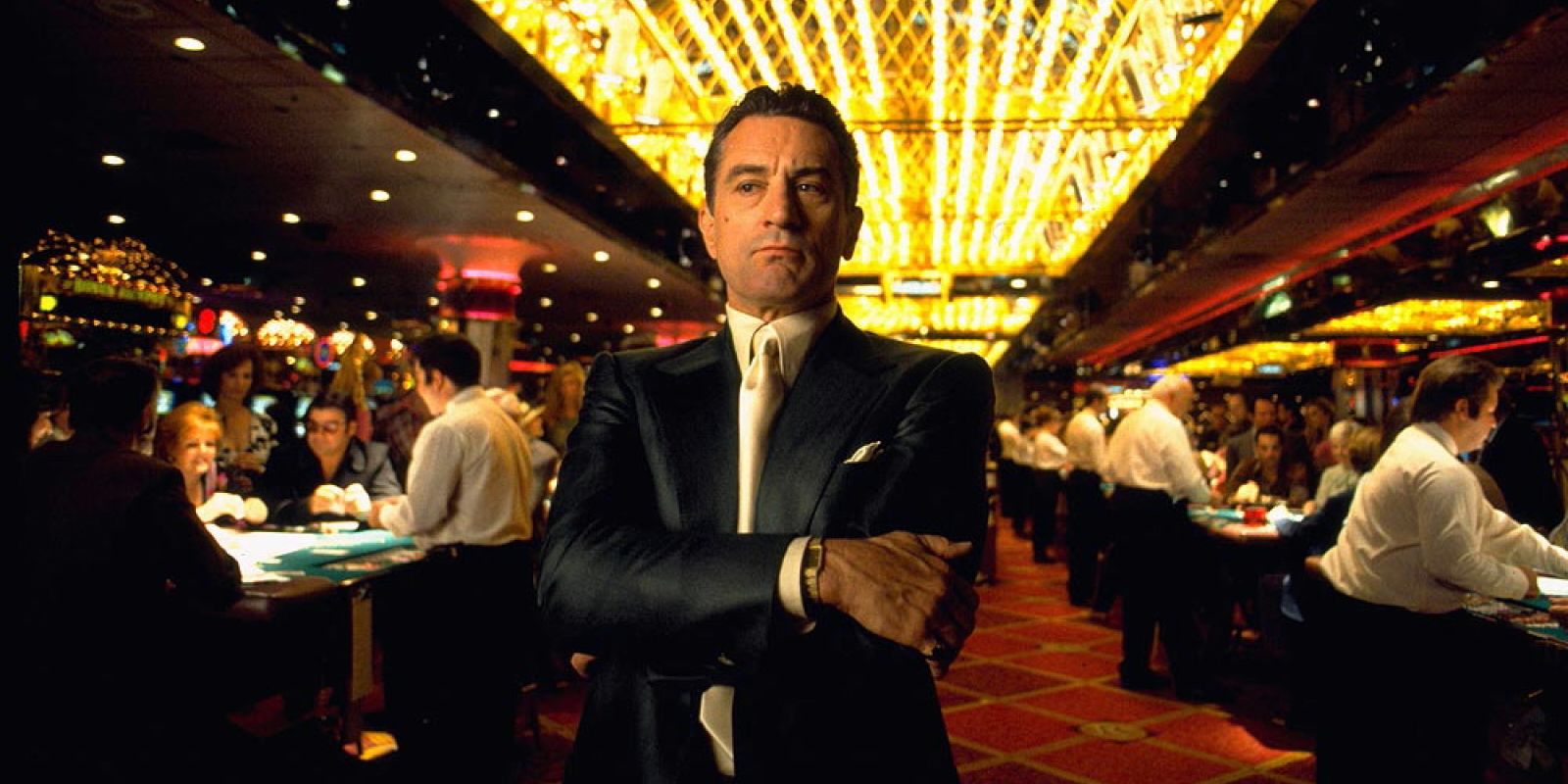 Robert De Niro standing in a casino
