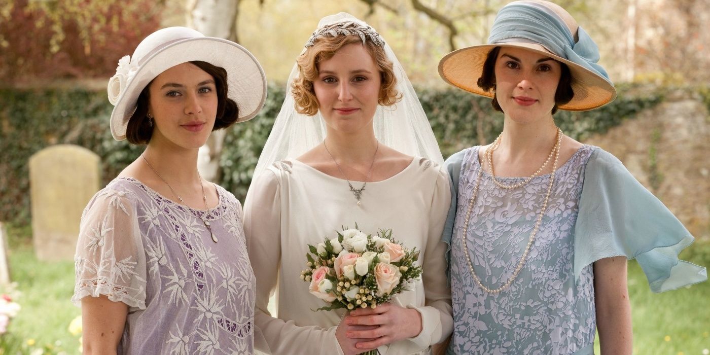 Lady Edith in wedding dress smiling with Sybbie and Mary 