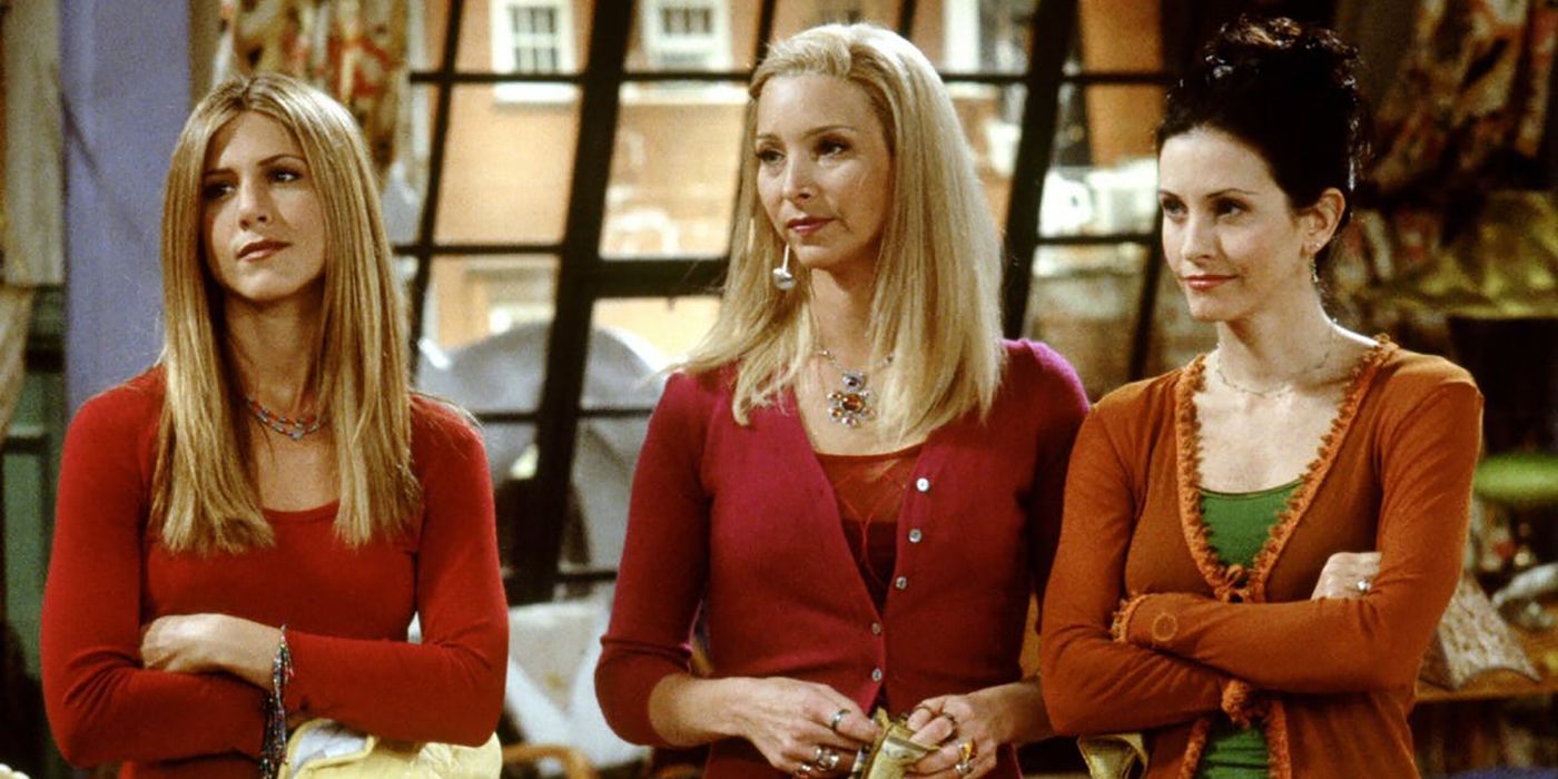 Rachel Phoebe Monica standing next to each other in Friends.