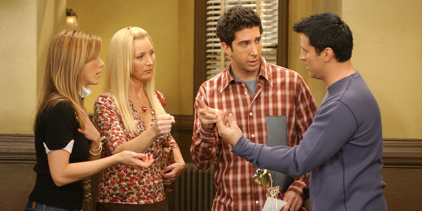 Rachel, Phoebe, Ross, and Joey standing in the apartment hallway in &quot;The One With The Late Thanksgiving&quot; episode of Friends