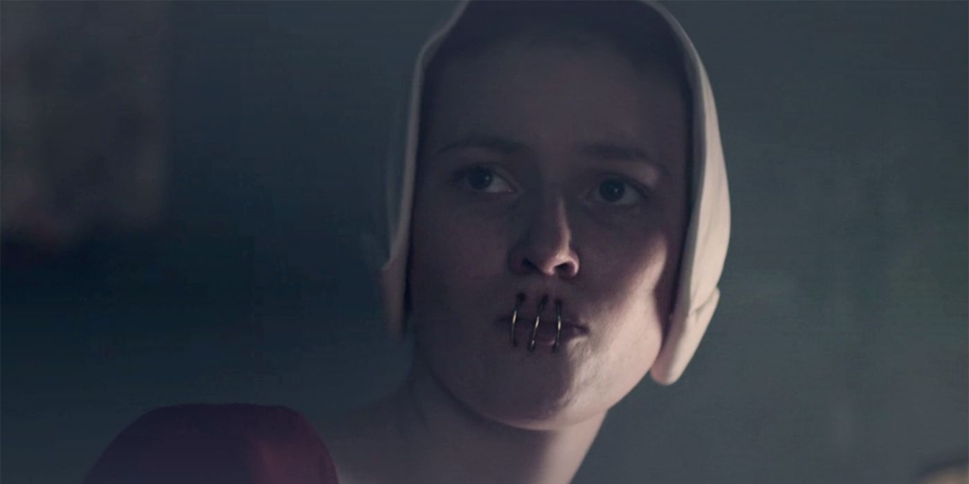 A handmaid with her mouth wired shut in The Handmaid's Tale.