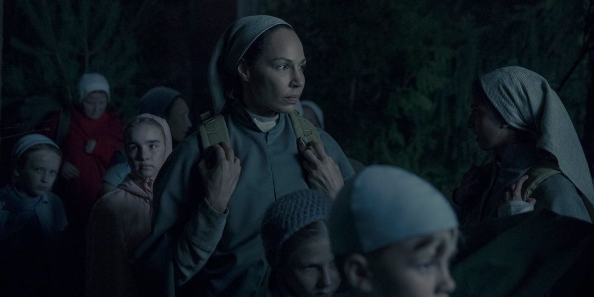 Rita from The Handmaid's Tale getting on the plane with kids during Mayday