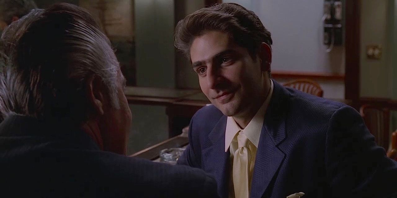 Michael Imperioli as Christopher Moltisanti smiling and talking to Paulie in The Sopranos