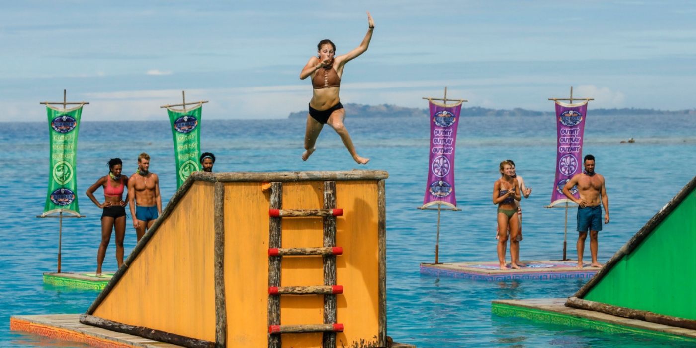 Woman jumping into water on Survivor