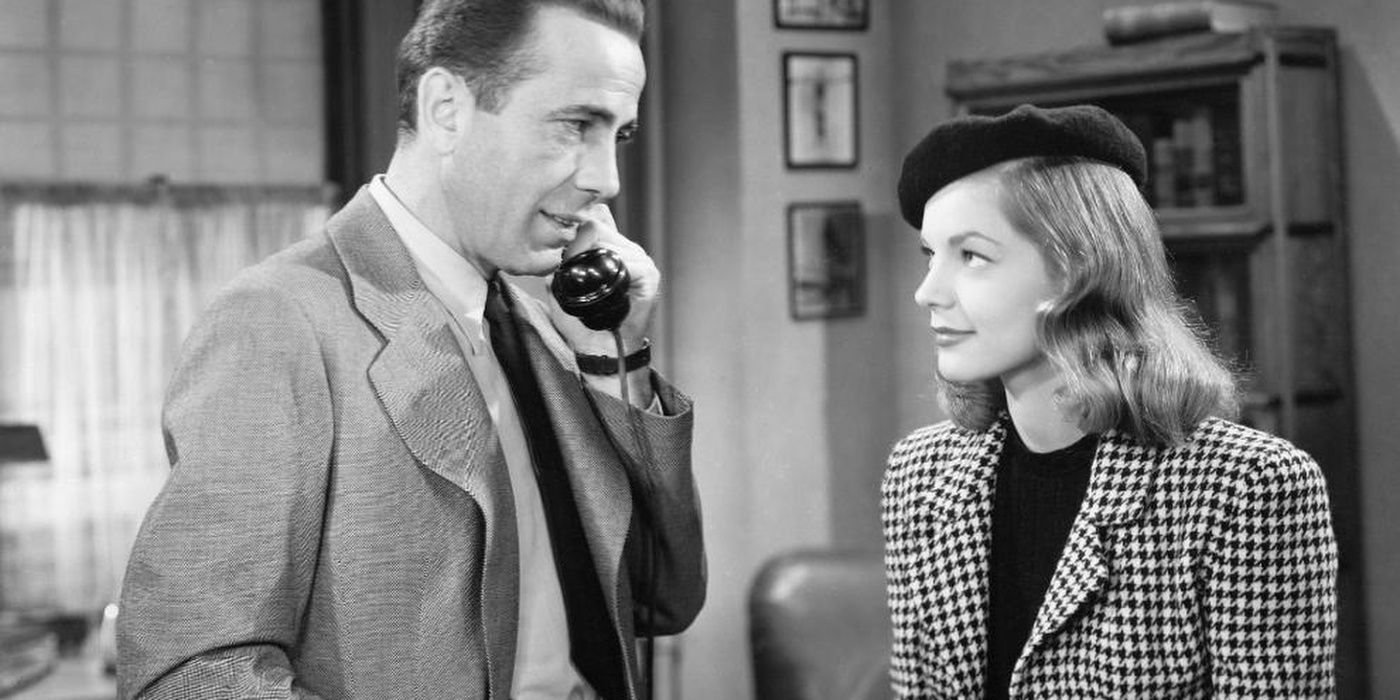Bogart and Bacall look at one another from The Big Sleep
