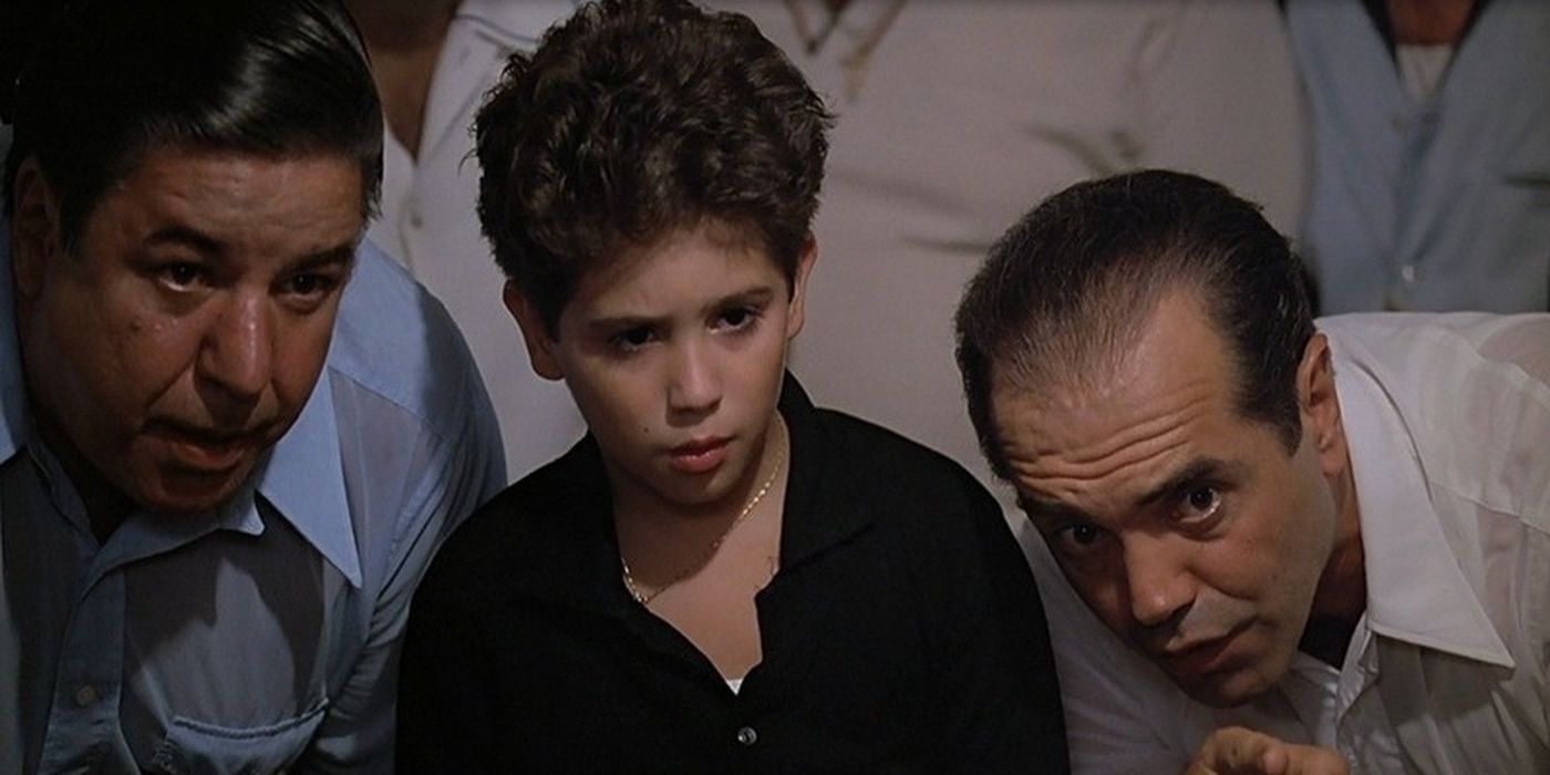 A kid with two mobsters in A Bronx Tale