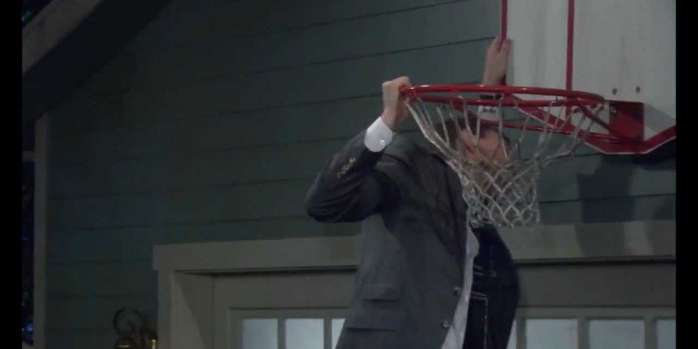 Barney tries to take the basketball hoop
