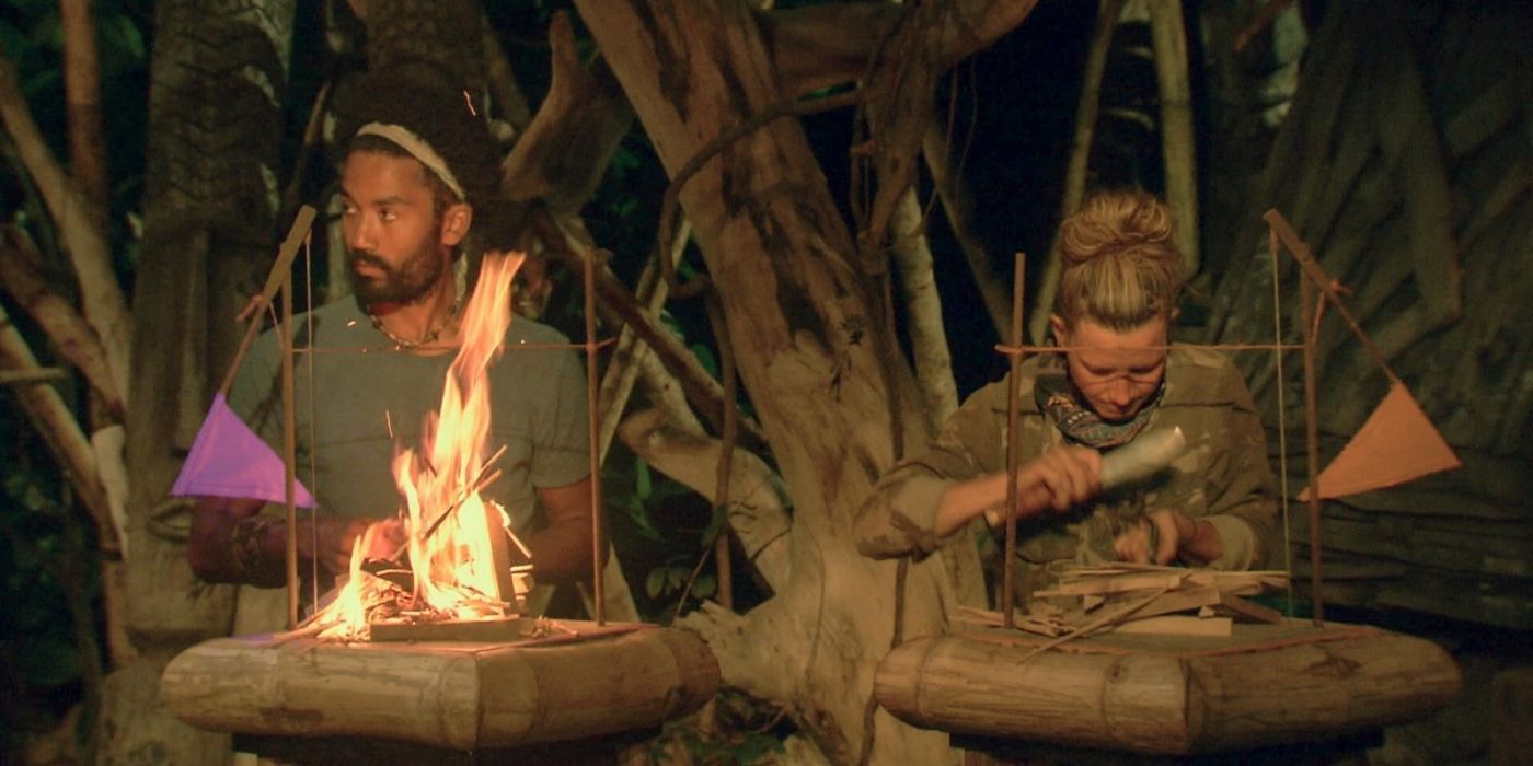 Players making a fire on Survivor