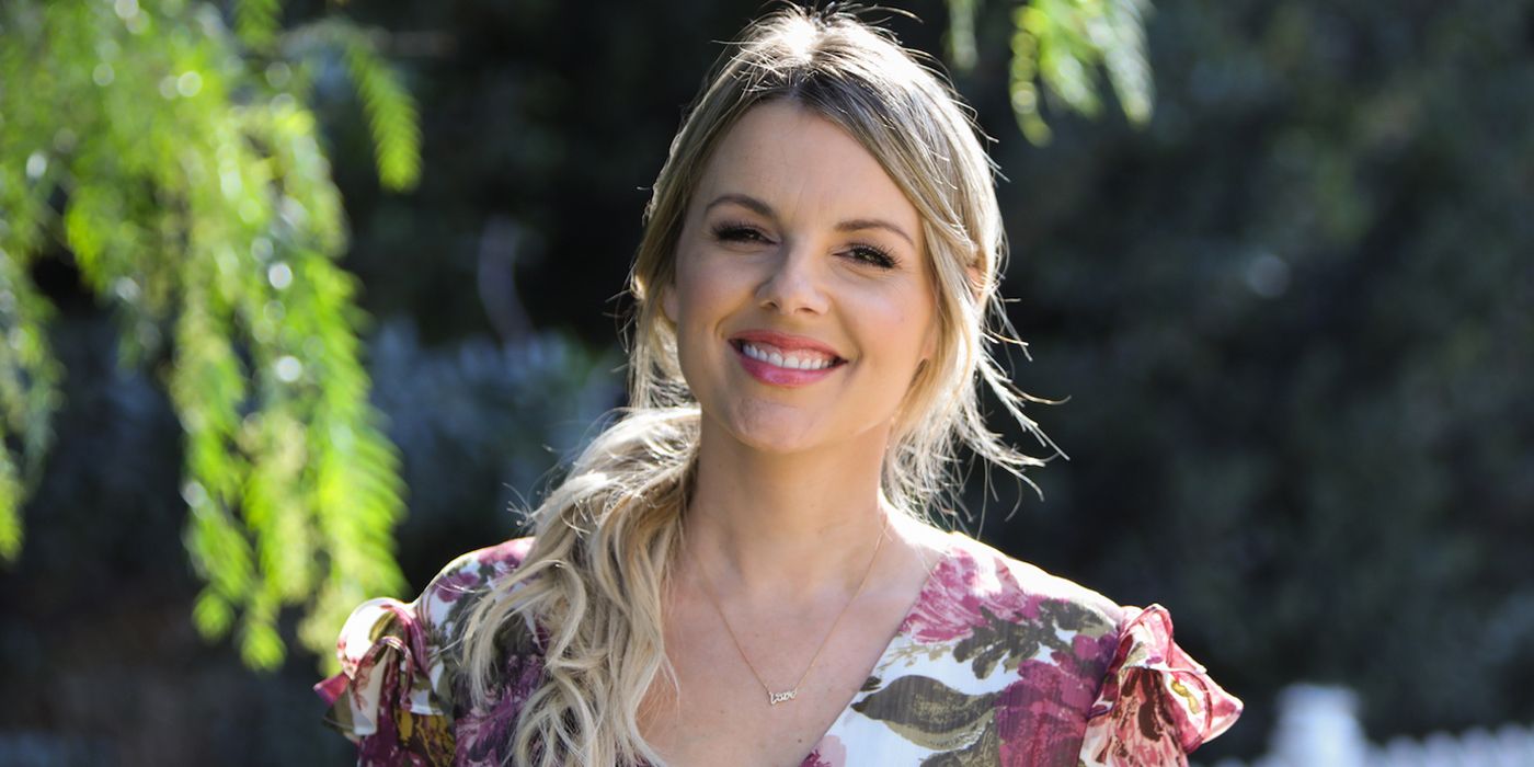 Ali Fedotowsky The Bachelorette smiling outside in print blouse