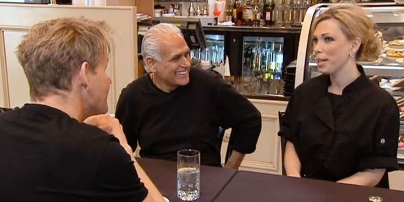 Chef Ramsay sitting at a table with the owners of Amy's Baking Company in a scene from Kitchen Nightmares.