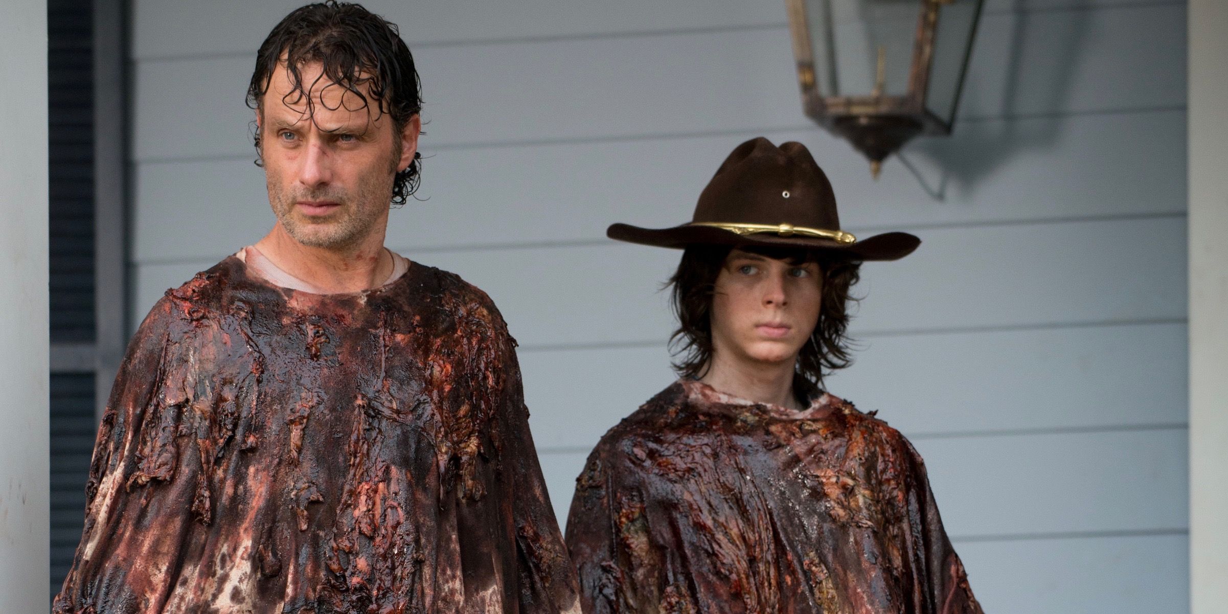 Andrew Lincoln and Chandler Riggs as Rick Grimes and Carl Grimes