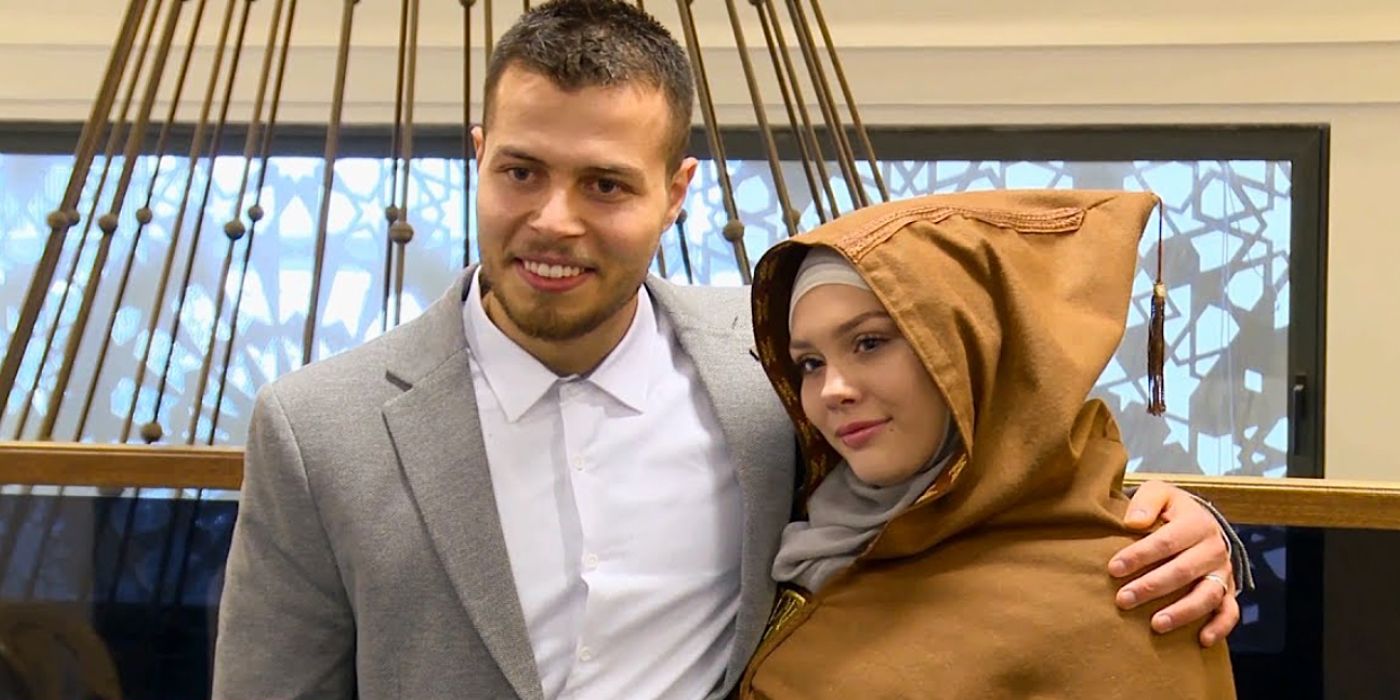 Avery and Omar 90 Day Fiance omar in gray suit, avery in brown robe with hoodAvery and Omar 90 Day Fiance omar in gray suit, avery in brown robe with hood