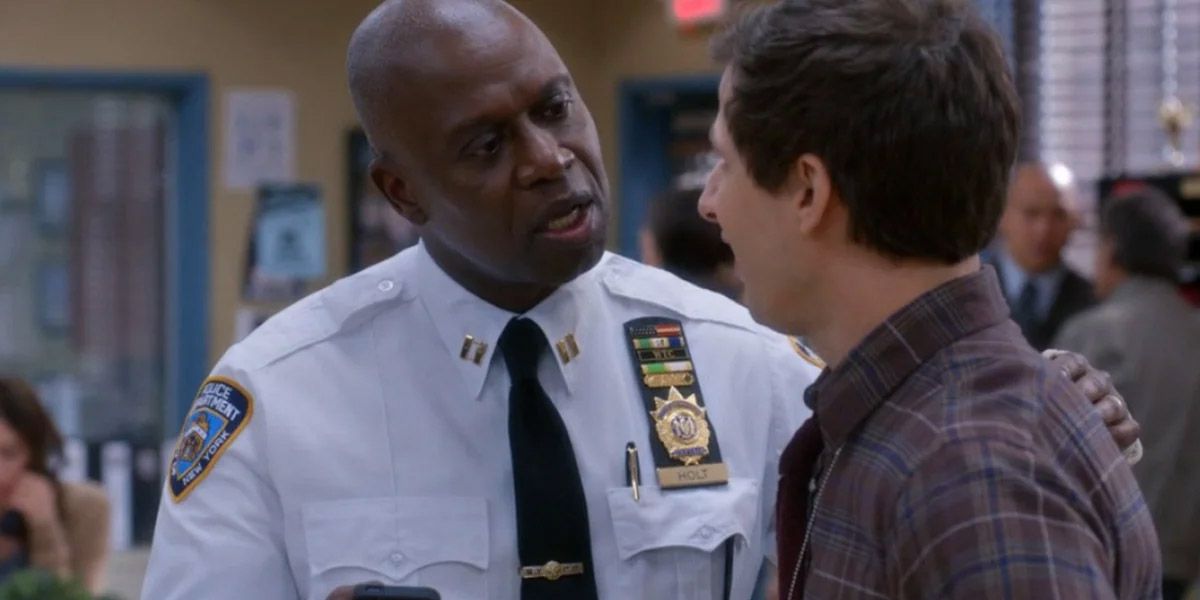 Captain Holt with his hand on the shoulder of Jake Peralta on Brooklyn Nine-Nine