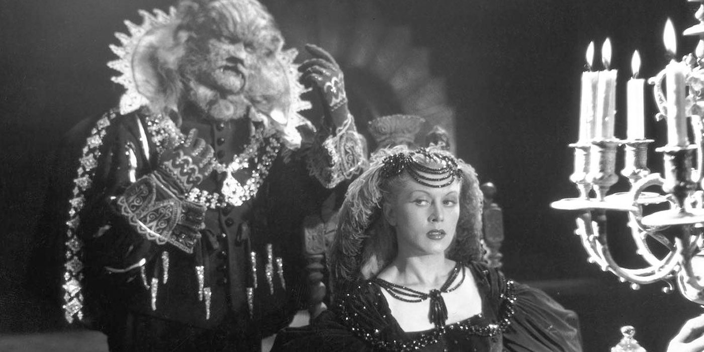The Beast stands behind Belle in 1946's Beauty and the Beast
