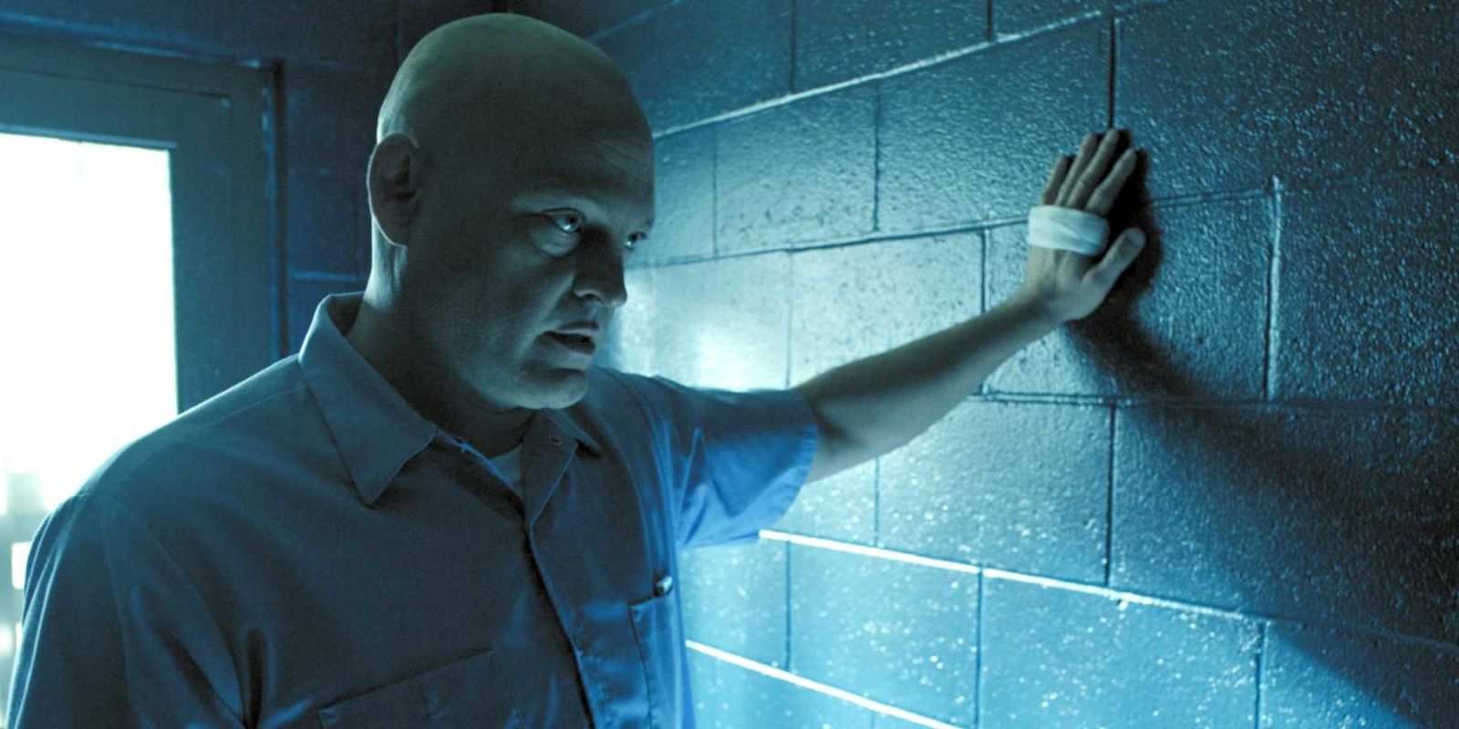 Brawl In Cell Block 99 Vince Vaughn menacingly holds a hand against the wall