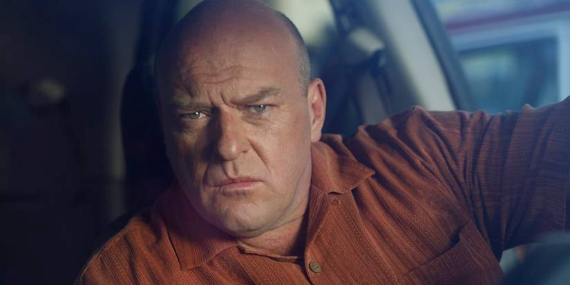 Hank Schrader watches intently from his car in Breaking Bad.