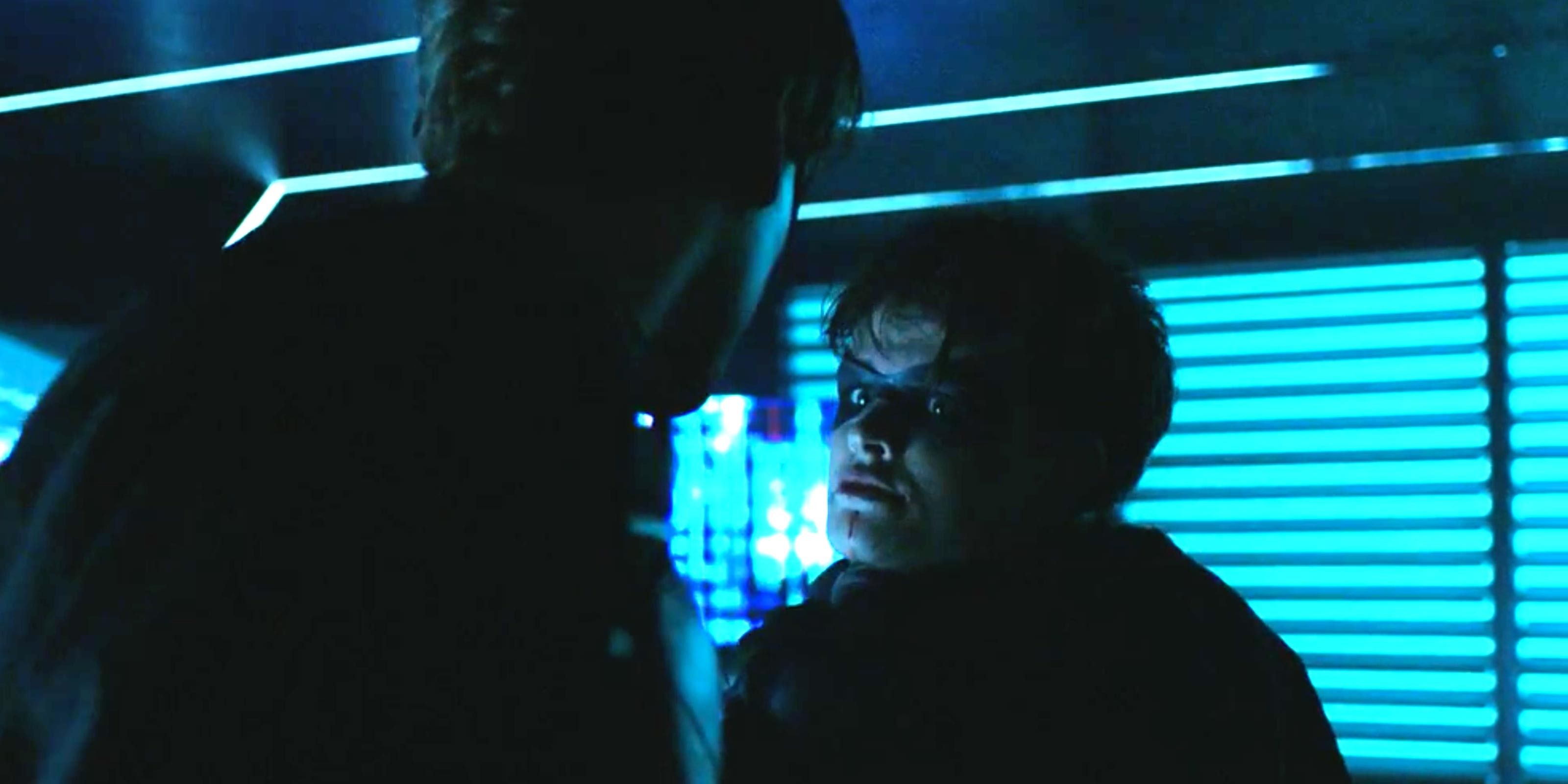 Brenton Thwaites as Dick Grayson Robin and Curran Walters as Jason Todd argue in Titans