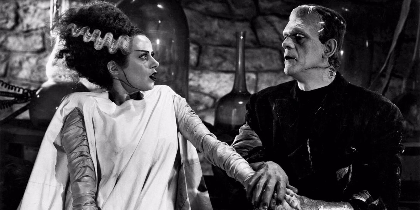 Monster holding the Bride's hand in Bride of Frankenstein