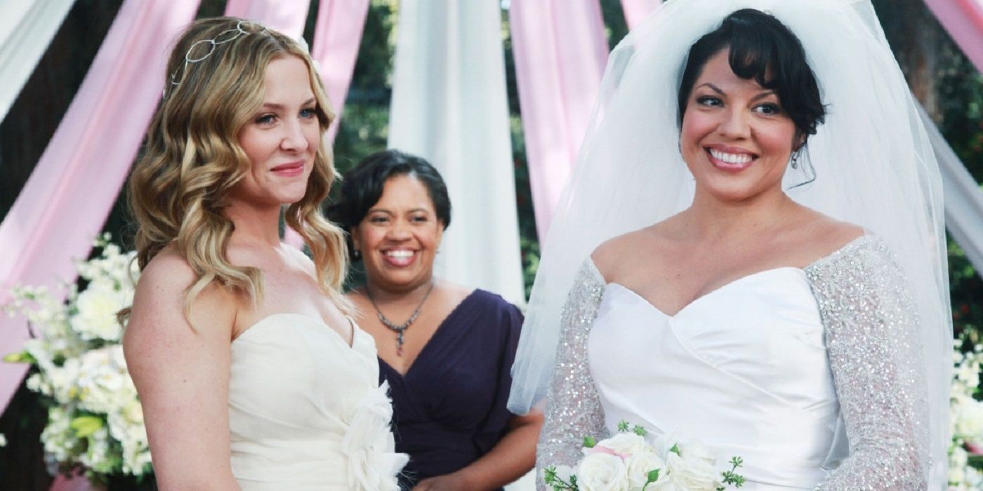 Callie and Arizona standing at their wedding altar in Grey's Anatomy