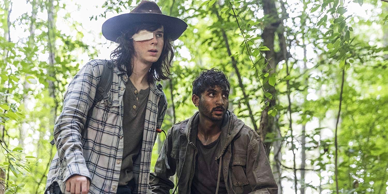 Chandler Riggs as Carl Grimes and Avi Nash as Siddiq in The Walking Dead