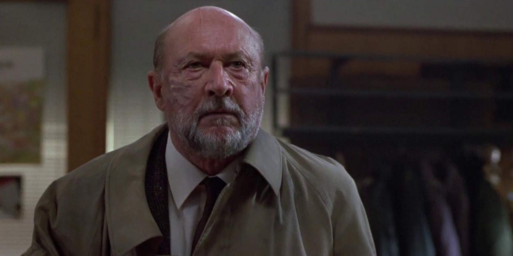 Donald Pleasance as Dr. Loomis in Halloween 4 with burns