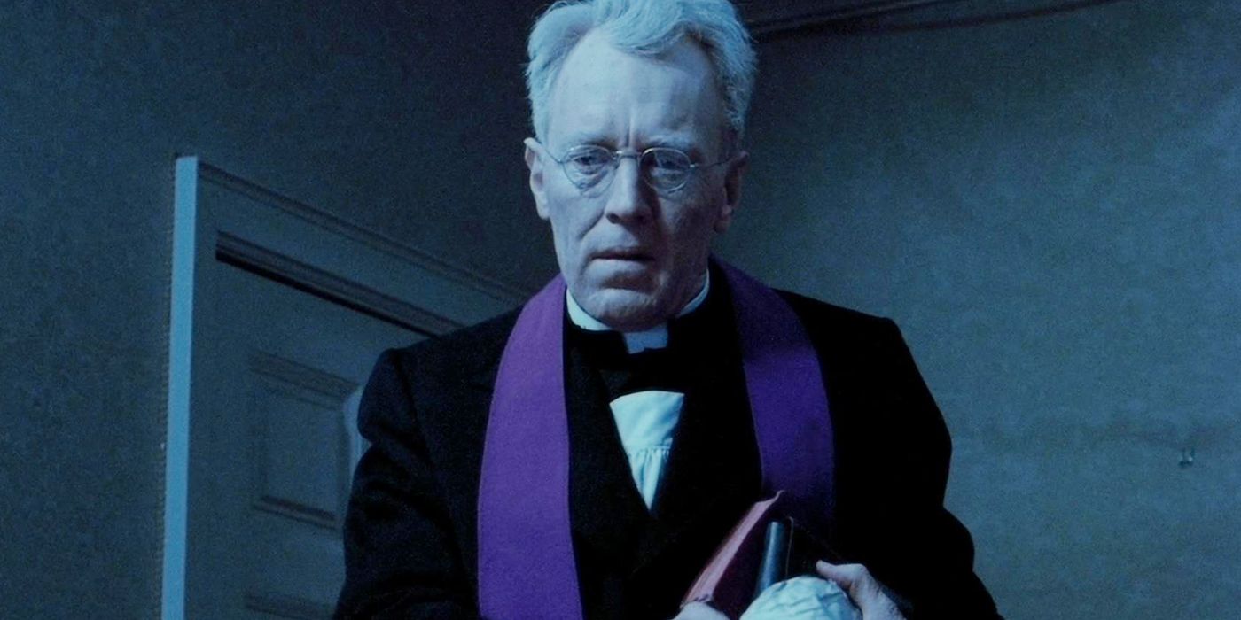 Father Merrin holds a bible in The Exorcist