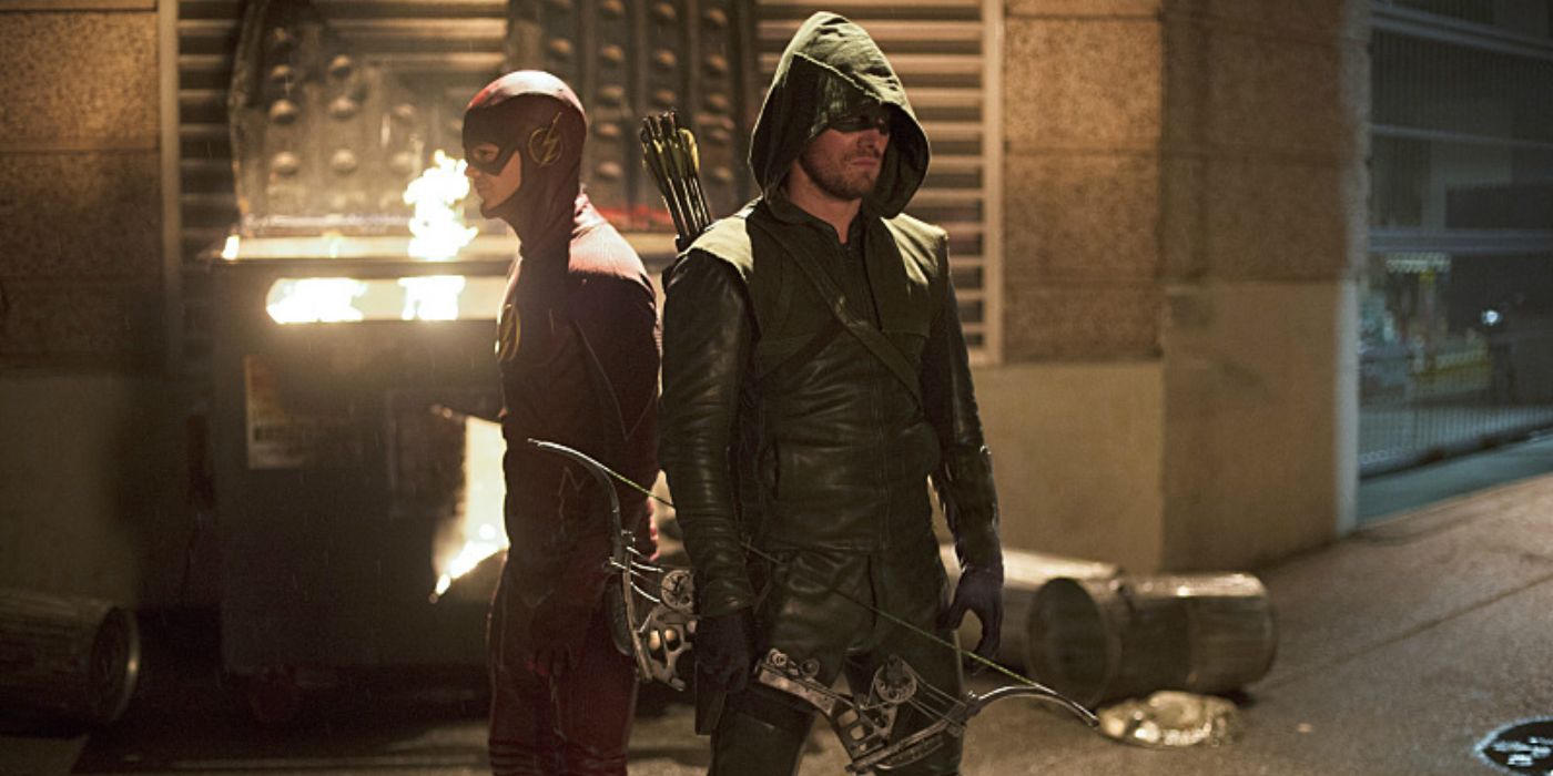 The Flash and Arrow stand back to back