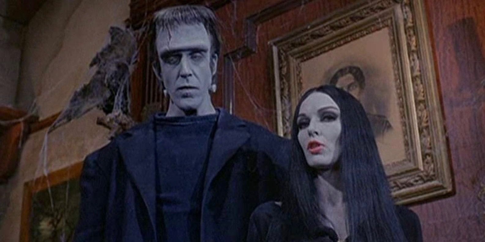 Fred Gwynne as Herman Munster and Joan Marshall as Phoebe Munster